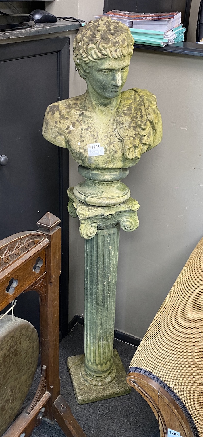 A reconstituted stone classical garden bust on ionic column, height 152cm
